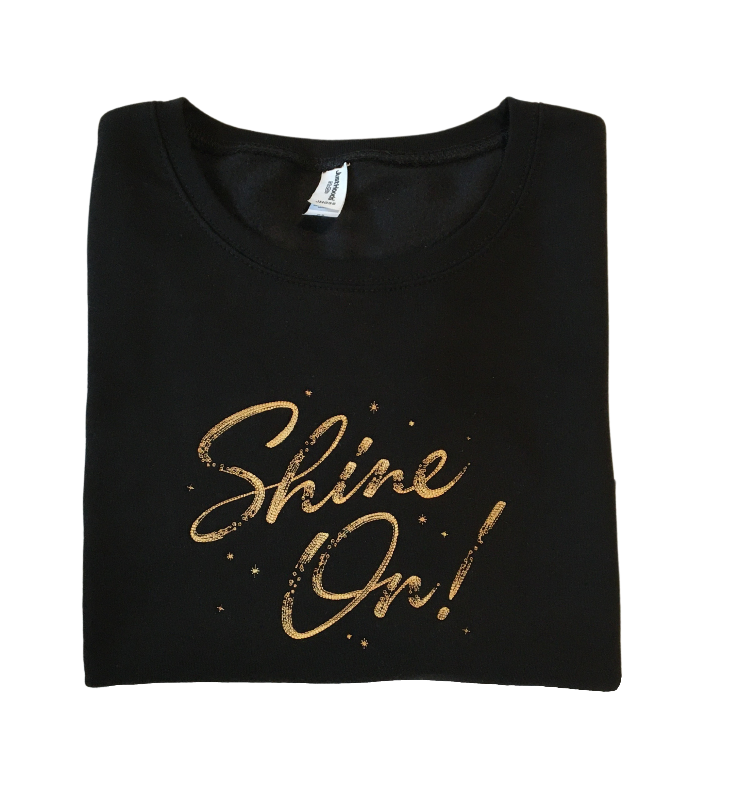 women shine on black cropped sweatshirt front closeup