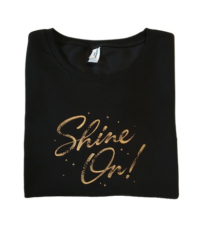 women shine on black cropped sweatshirt front closeup